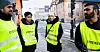 GULE VESTER: Streiken er i gang ved Oslo Regnskapskontor. Fra venstre: John Thomas Suhr, leder i Oslo/Akershus HK, Yinbing Lu, Elizabeta Aladjakova og Kaweh Almassy, organisasjonsmedarbeider i HK region Øst.