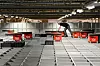 ROBOTER: Pio jobber med Autostore, som er logistikk-roboter som blant annet brukes av netthandelskjeden Komplett, der bildet er tatt. (Arkivfoto)
